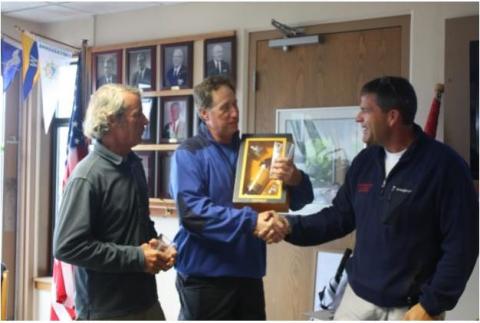 Brian Tyrell presents Dale Dunning and Eric Taylor with the customary bottle of scotch to the Pacific District Champion which was shared with all.