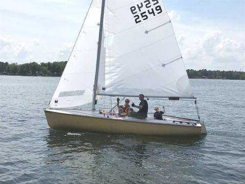  The Phinneys show us family sailing at its best. Nate (Dad), when responding to our request for impressions of his Make Your Scot Fly experience, said his son liked best that his name was on the MYSF completion certificate along with Mom and Dad.
